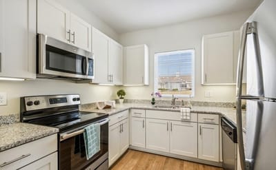 Modern kitchen with appliances and natural light