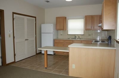 A kitchen area in a senior apartment