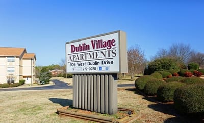 Exterior view of Dublin Village Apartments sign