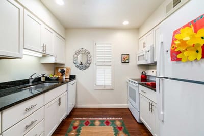 Bright kitchen with modern appliances and decor