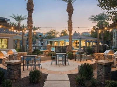 Outdoor patio with seating and barbecue grills