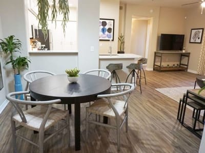 Interior view of a stylish common area with a dining table