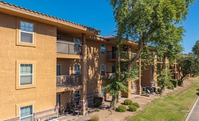 Exterior view of a senior living facility with balconies