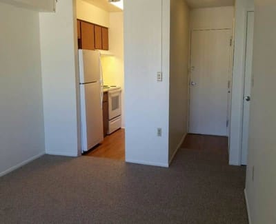 Interior view of a resident room with kitchen