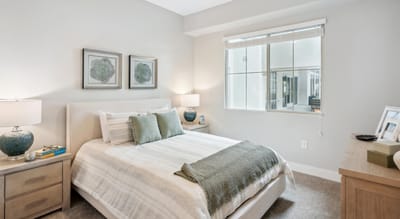 Cozy interior of a resident bedroom with natural light