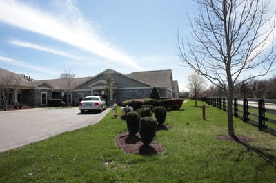 Exterior view of Morning Pointe Senior Living with landscaping