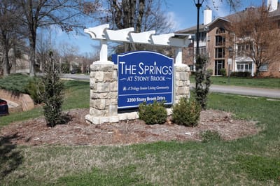 Sign of The Springs at Stony Brook in a landscaped area