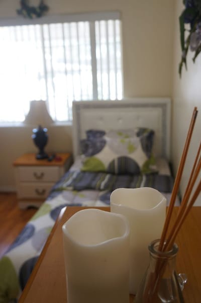 Cozy resident room with bed and decorative items