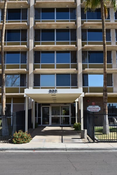 Entrance of Fellowship Towers with signage
