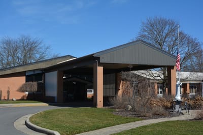 Front entrance of St. Ann's Home with landscaped area
