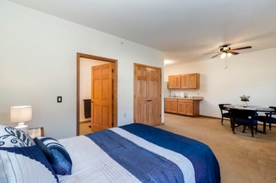 Private resident room with kitchenette and sitting area