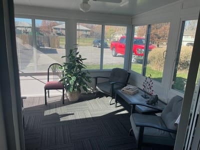 Sunroom with seating and plants