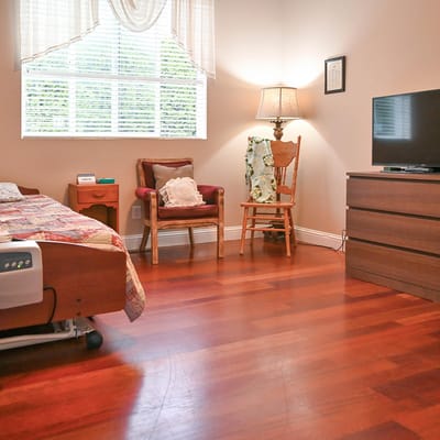 Cozy interior of a resident room with hardwood floor