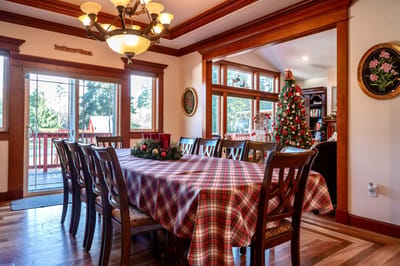 Dining room with a large table and holiday decor