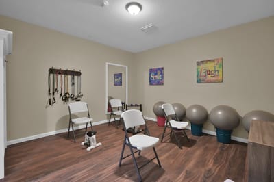Interior fitness room with exercise equipment
