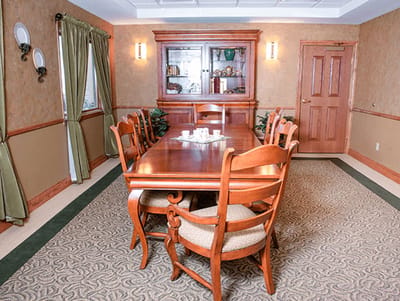 Dining area with wooden table and chairs