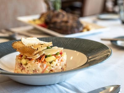 A beautifully plated salad in the dining area