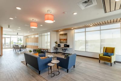 Bright and inviting common area with seating