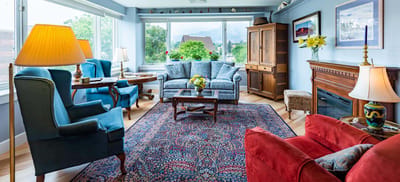 Bright common area with comfortable seating and decor