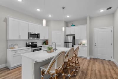 Modern kitchen layout in a bright interior space