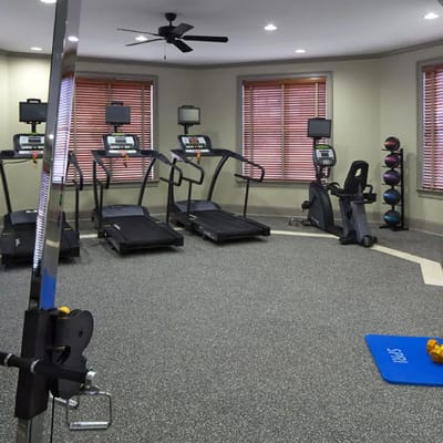 Interior view of a fitness room with exercise equipment