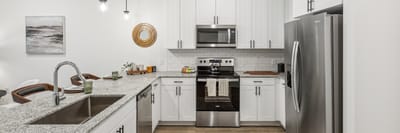 Modern interior kitchen with stainless steel appliances