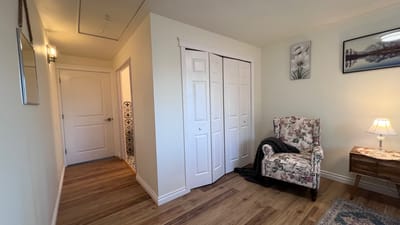 Cozy interior corner with a chair and lamp