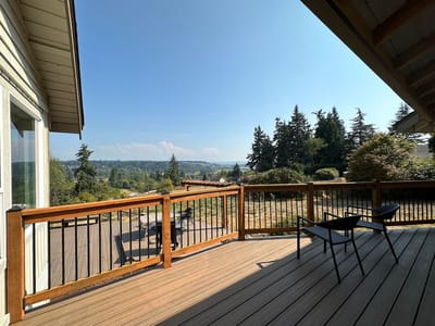 View of a deck overlooking a scenic landscape