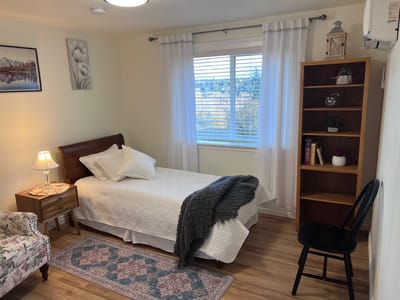 Cozy interior bedroom with a single bed and decor