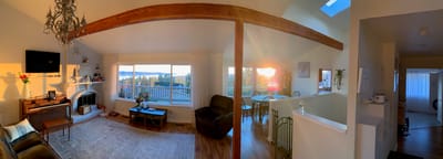 Cozy living room with sunset view and seating