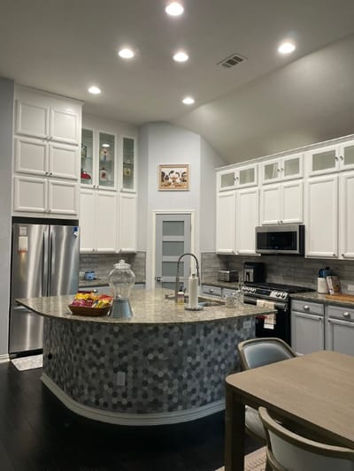 Bright kitchen area with modern appliances