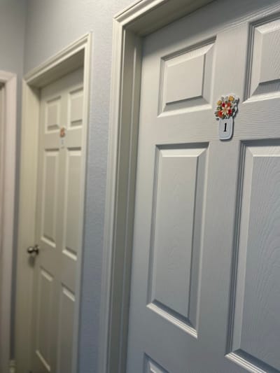 Interior view of resident room doors in a care home