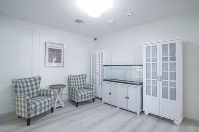 Bright and airy sitting area with comfortable chairs