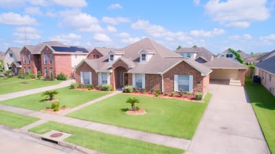 Aerial view of a single-family house in a residential area