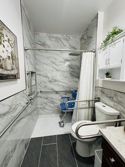 A clean and accessible bathroom with safety features