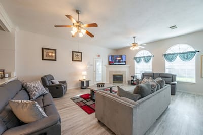 Cozy living area with comfortable seating and a fireplace