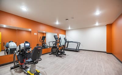Interior view of a fitness room with equipment