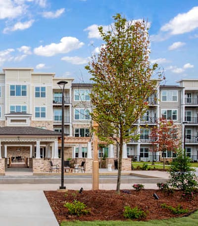 Exterior view of StonePointe Senior Living with landscaped area