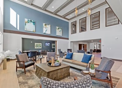 Bright common area with seating and artwork