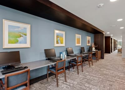 A common area with computer stations and artwork