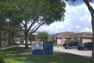 Exterior view of Solaris Healthcare College Park with sign