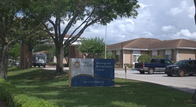 Facility logo with nursing and rehabilitation center signage