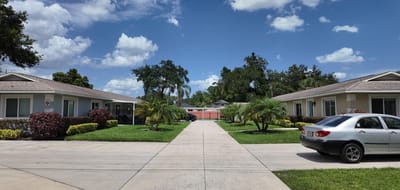 Outdoor view of the facility with landscaped gardens