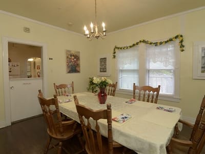 Dining room with a large table and chairs