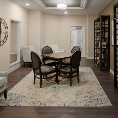 Bright common area with seating and a table