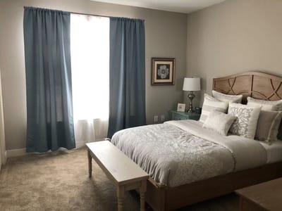 Cozy interior room with a bed and window