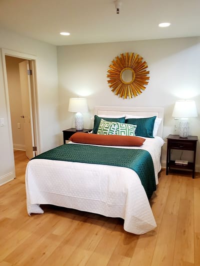 Stylish private resident room with a bed and decor