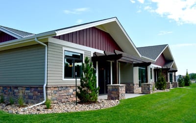 Exterior view of Columbine Patio Homes with landscaping