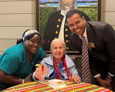 Residents and staff enjoying a fun moment together