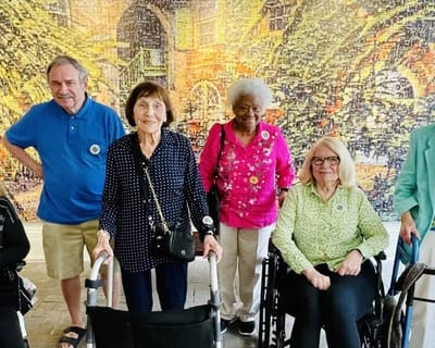 Residents posing together in a common area